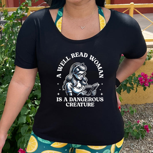 model wearing the "A Well Read Woman Is A Dangerous Creature" black slouchy shirt