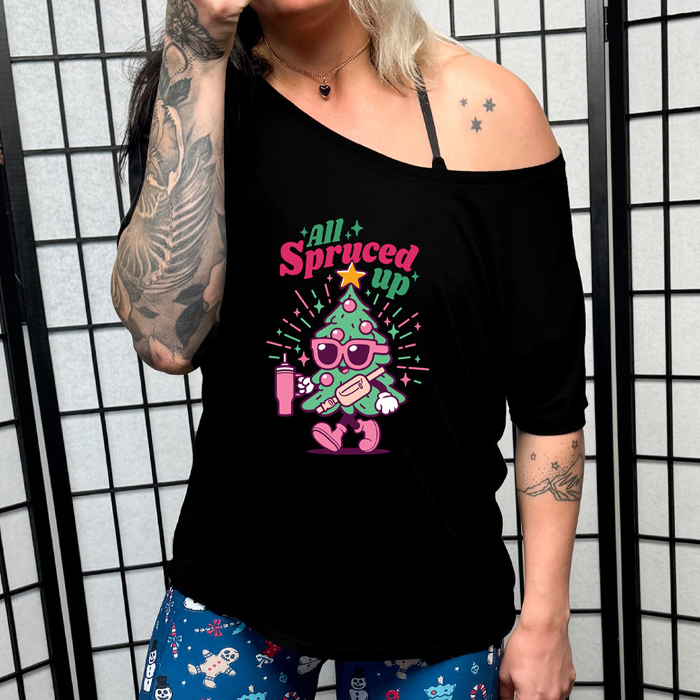 black slouchy shirt with the text "All Spruced Up" 