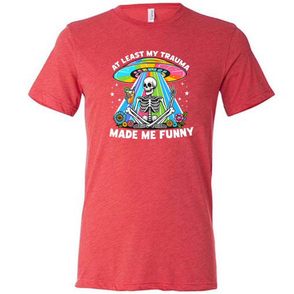 red shirt with the text "At Least My Trauma Made Me Funny" on it