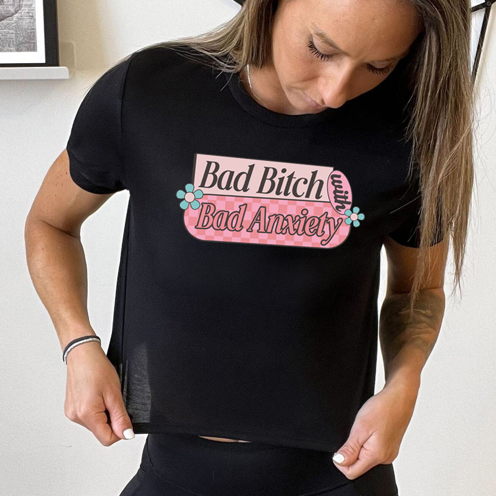 model wearing the Bad Bitch With Bad Anxiety Cropped Tee