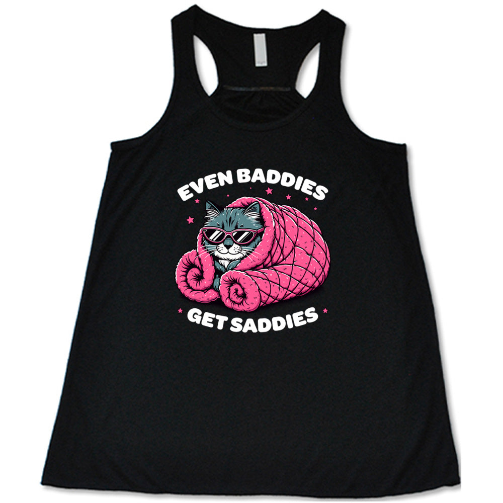 black shirt with a cat graphic and the text "Even Baddies Get Saddies" on it