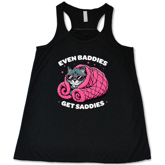 black shirt with a cat graphic and the text "Even Baddies Get Saddies" on it