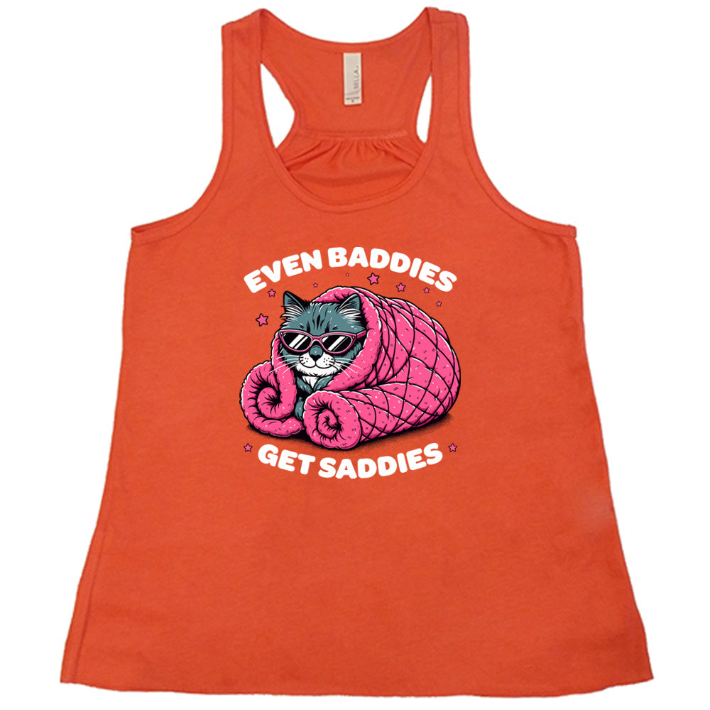 coral shirt with a cat graphic and the text "Even Baddies Get Saddies" on it