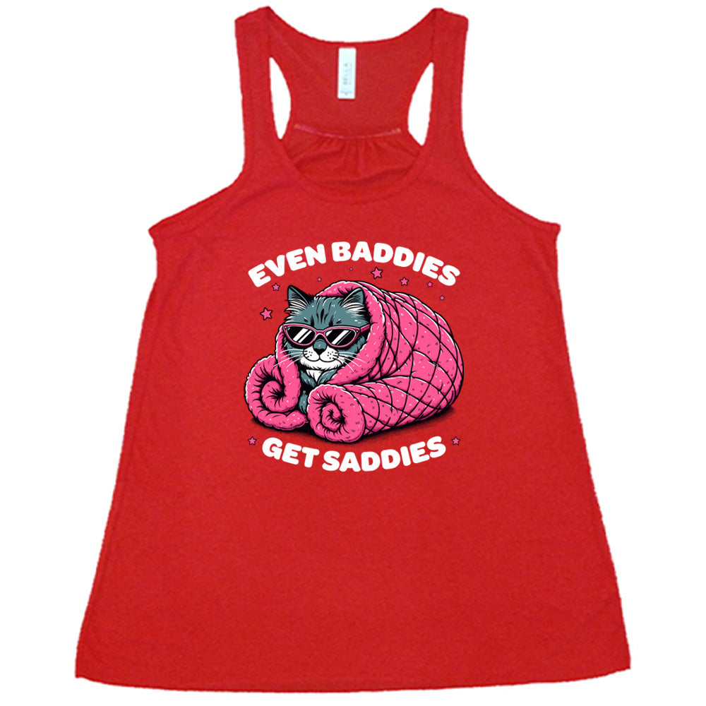 red shirt with a cat graphic and the text "Even Baddies Get Saddies" on it