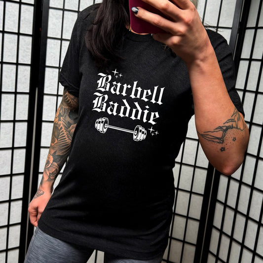 black shirt with the text "Barbell Baddie" on it