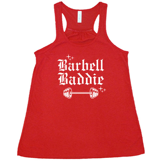 red shirt with the text "Barbell Baddie" on it