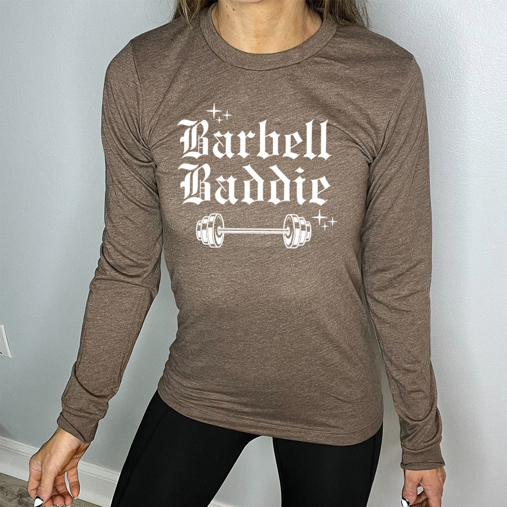 brown long sleeve with the text "Barbell Baddie" on it