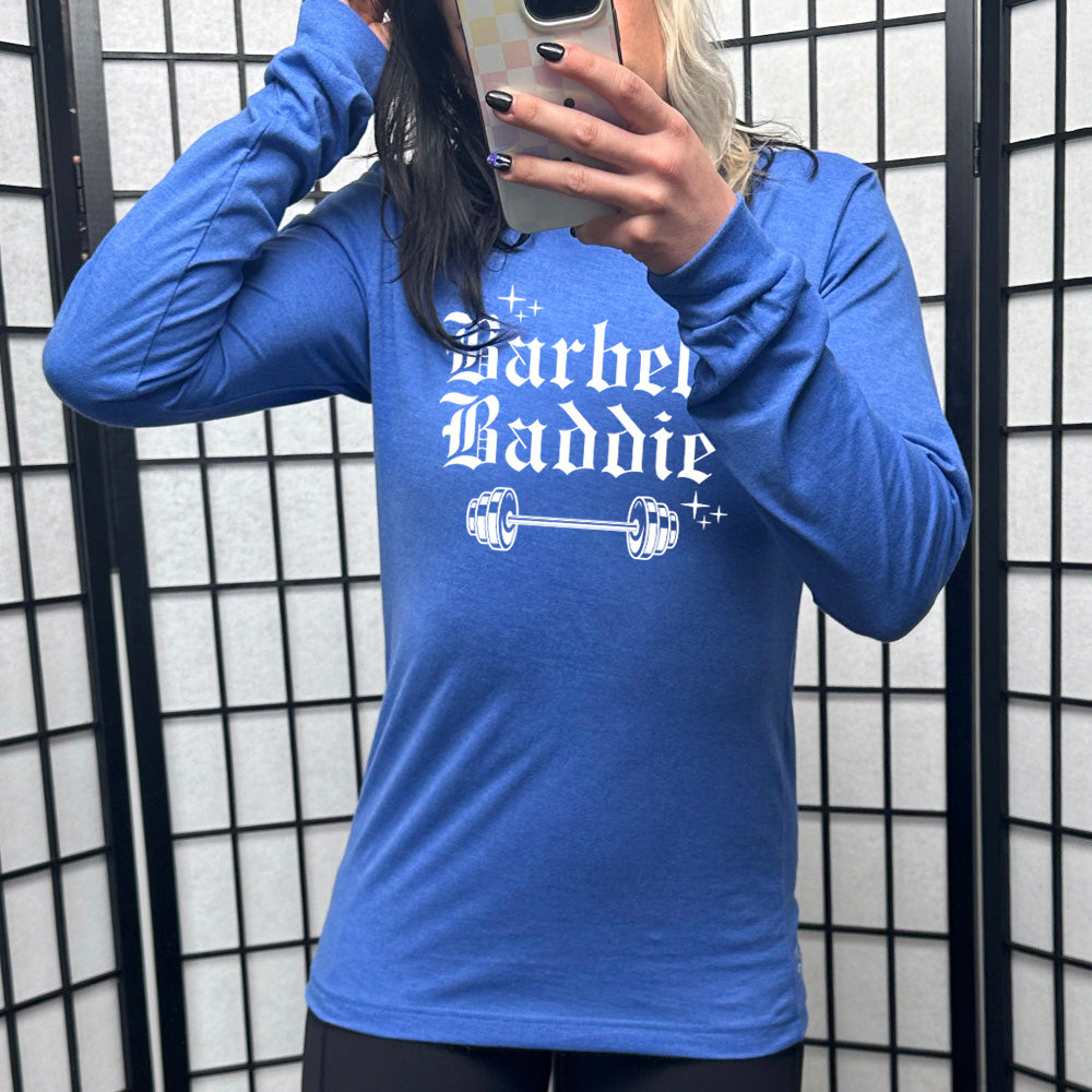 blue long sleeve with the text "Barbell Baddie" on it