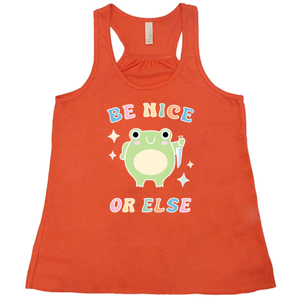 coral shirt with the text "Be Nice Or Else" on it