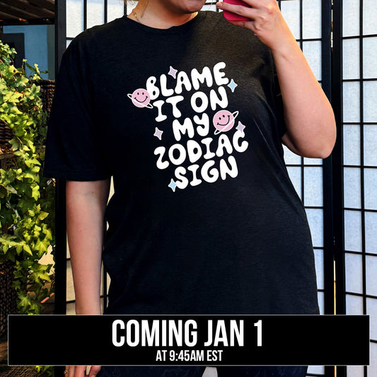 shirt with the text "Blame It On My Zodiac Sign" on it coming soon