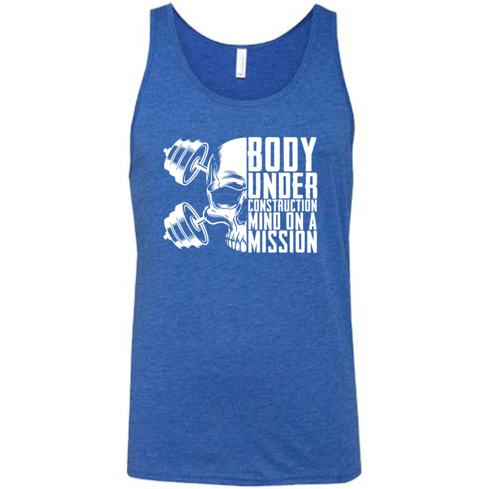 blue shirt with the text "Body Under Construction, Mind on a Mission" on it