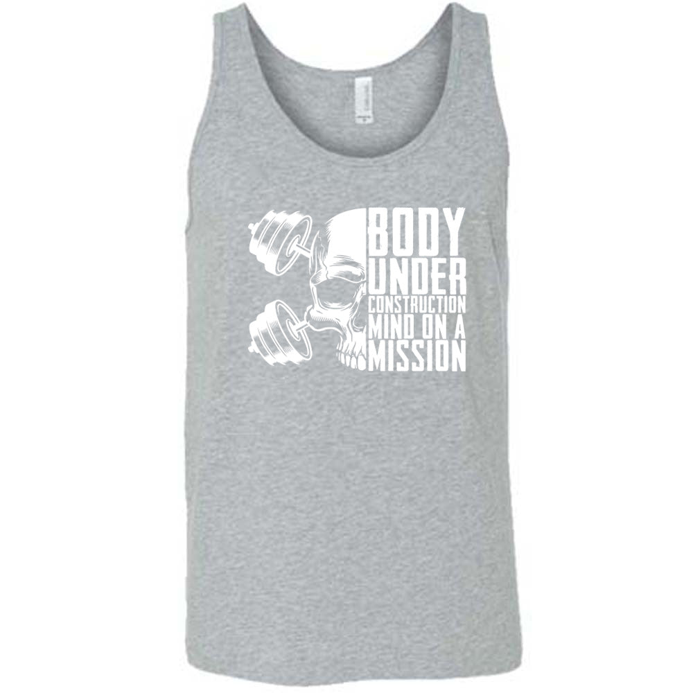 grey shirt with the text "Body Under Construction, Mind on a Mission" on it