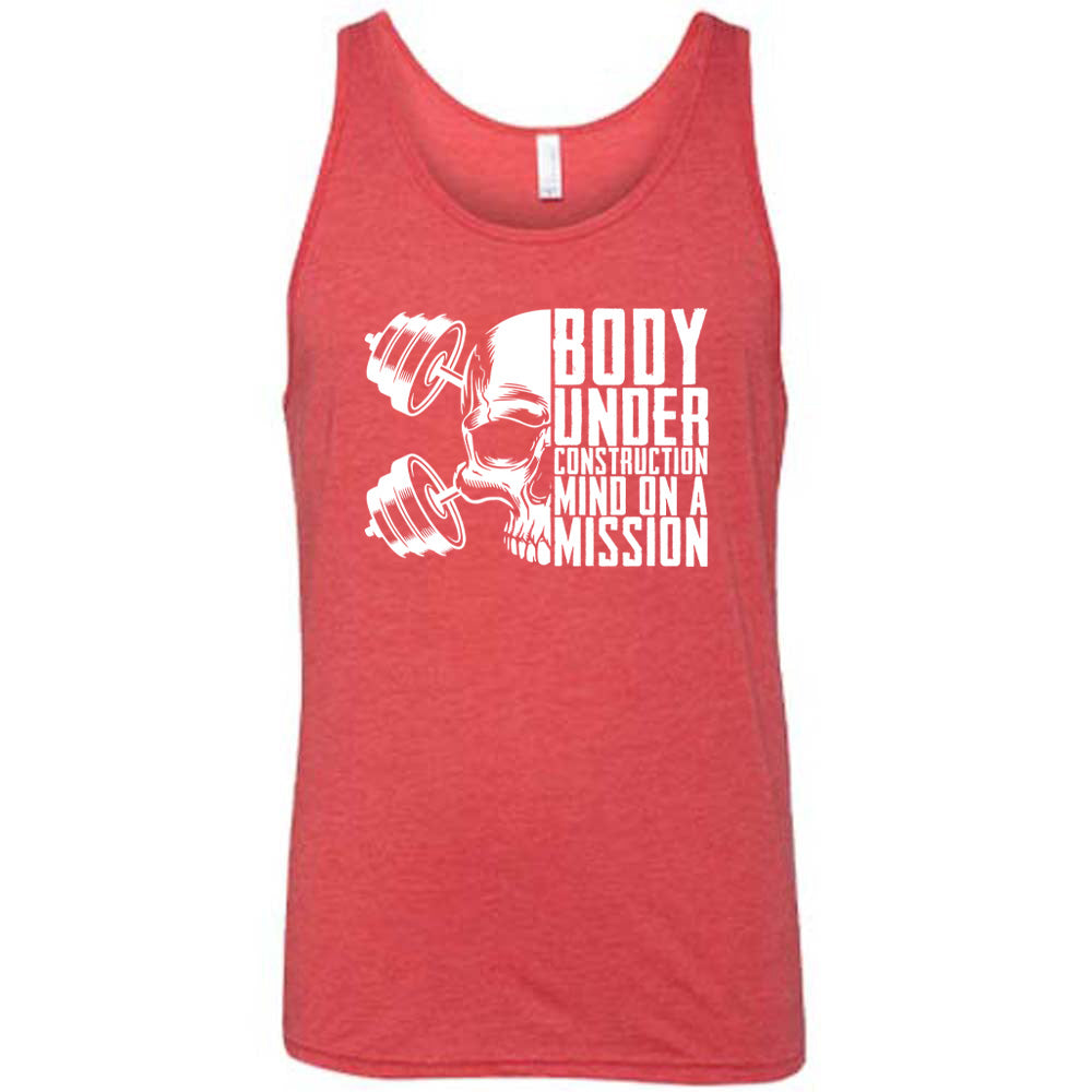 red shirt with the text "Body Under Construction, Mind on a Mission" on it