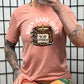 coral shirt with the text "Burn Baby Burn" on it