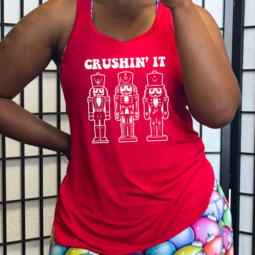 red shirt with the text "Crushin' It" with nutcracker graphics on it