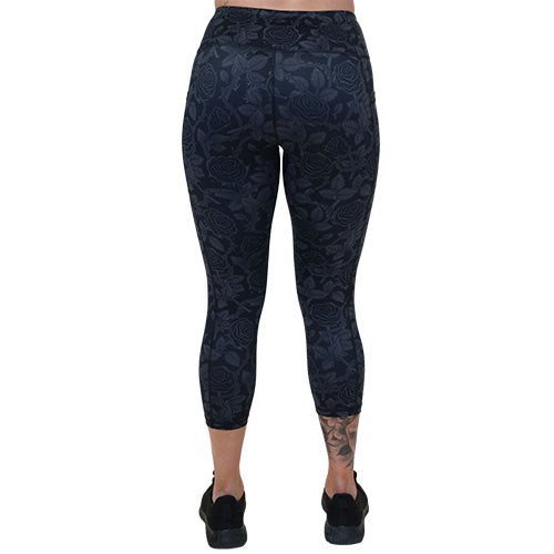 back of capri length black and grey rose patterned leggings