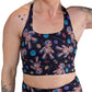 black voodoo doll patterned sports bra