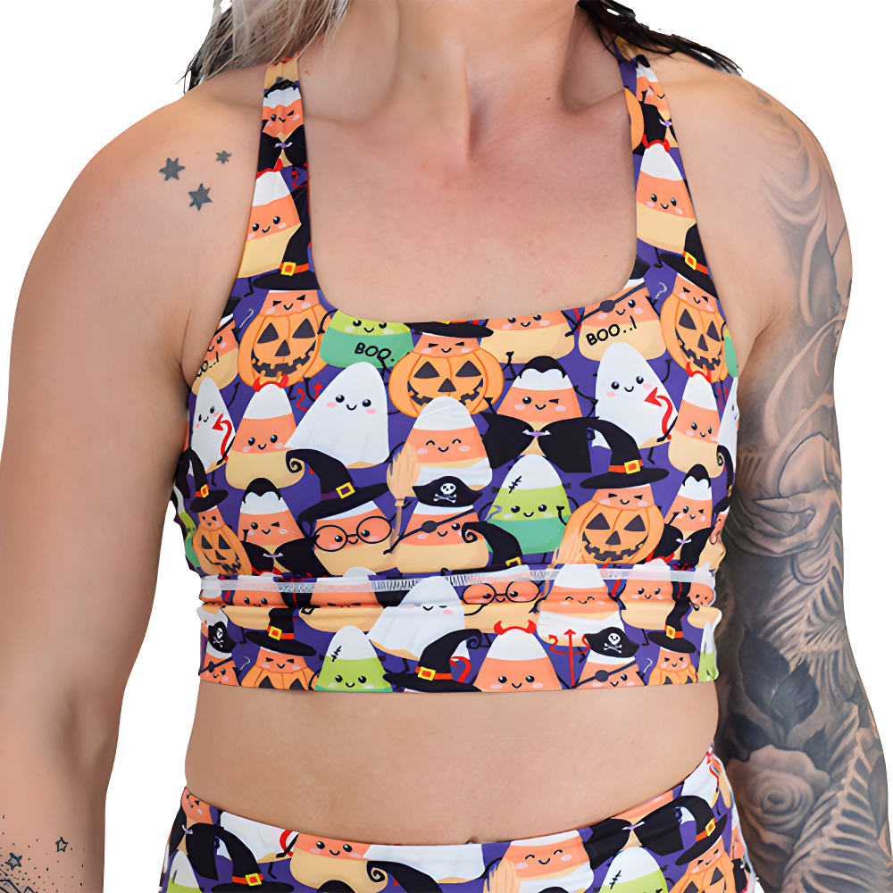 halloween candy corn patterned sports bra