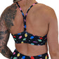 back of the Christmas lights patterned sports bra