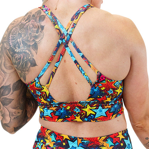 back of comic book stars patterned sports bra