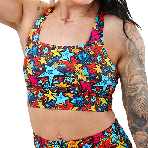 comic book stars patterned sports bra