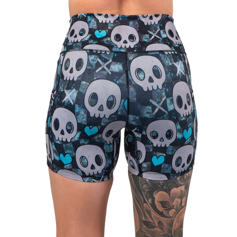 back of the blue hearts and skulls patterned shorts 