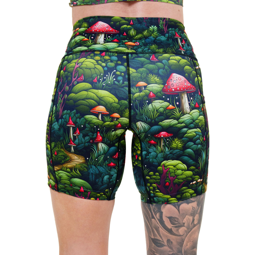 back of 7 inch enchanted forest themed shorts