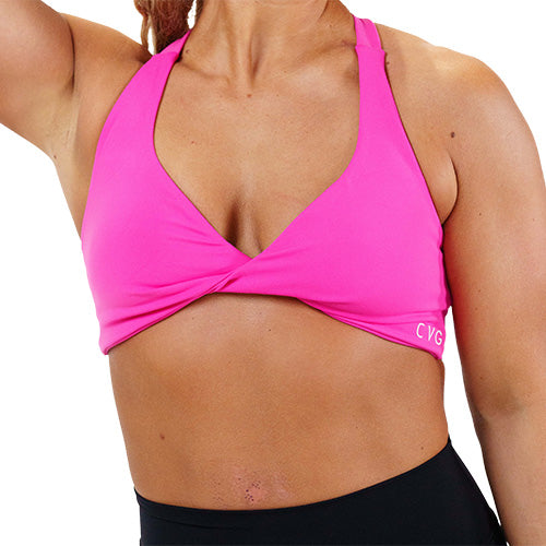 solid pink twist sports bra