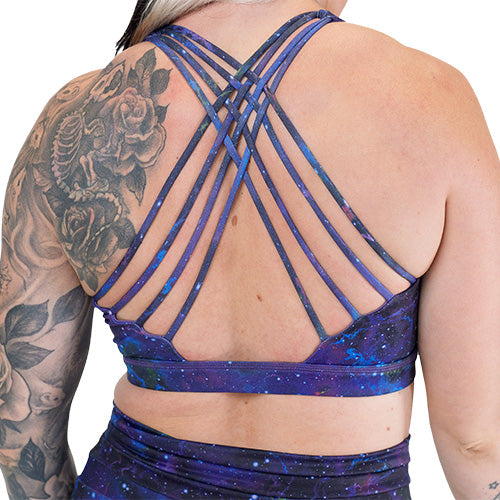 back of the galaxy patterned sports bra