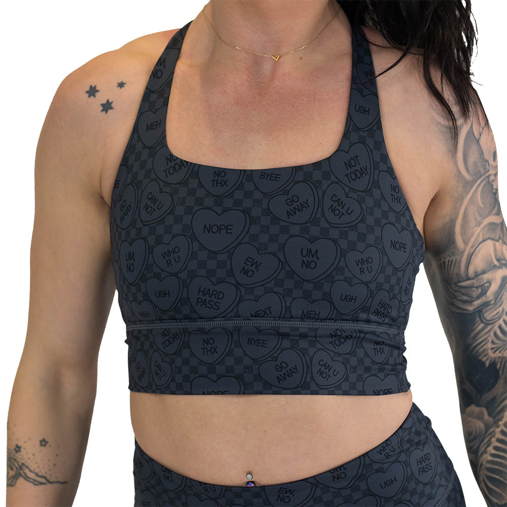 black and grey heart patterned sports bra