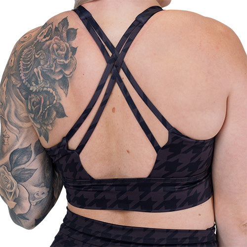 back of the houndstooth patterned sports bra