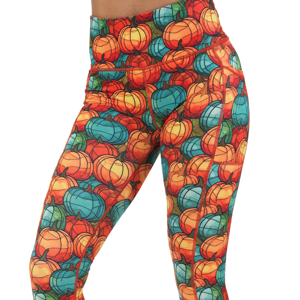 orange and blue mini pumpkin patterned leggings