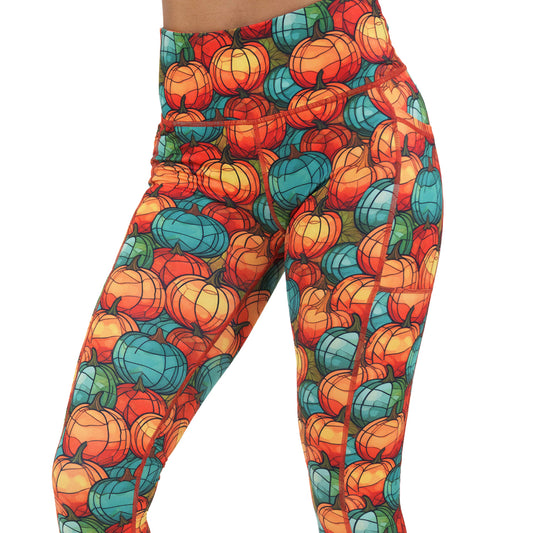 orange and blue mini pumpkin patterned leggings