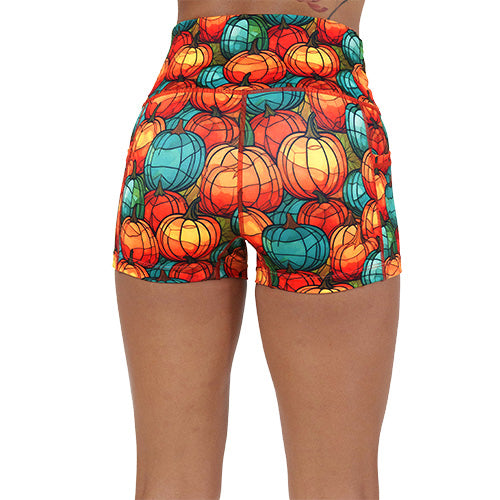 back of the 2.5 inch orange and blue mini pumpkin patterned shorts