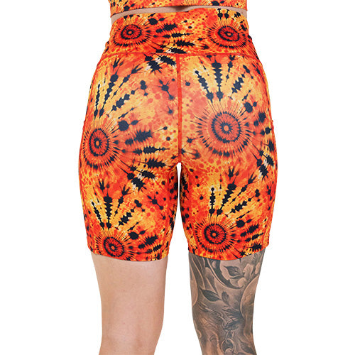 back of the 7 inch black and orange tie dye shorts