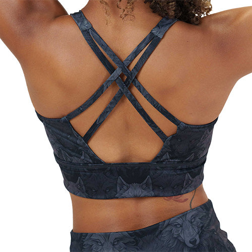 back of the black and grey wolves patterned sports bra