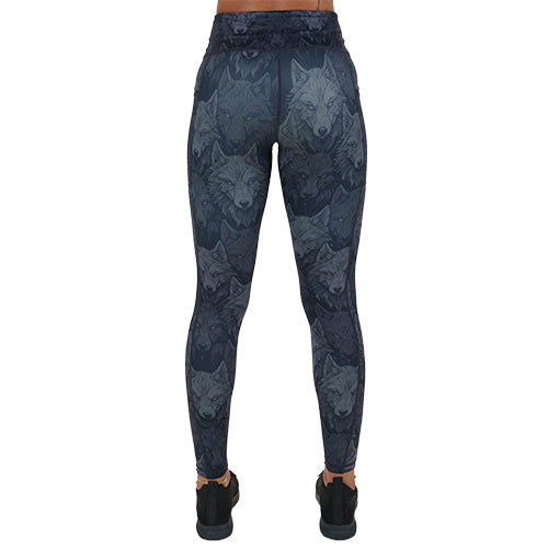 back of black and grey wolves patterned leggings