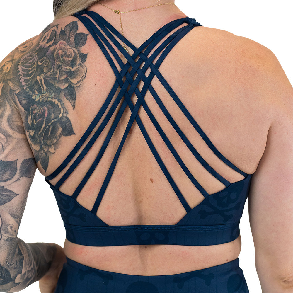 back of the skull and bones patterned sports bra