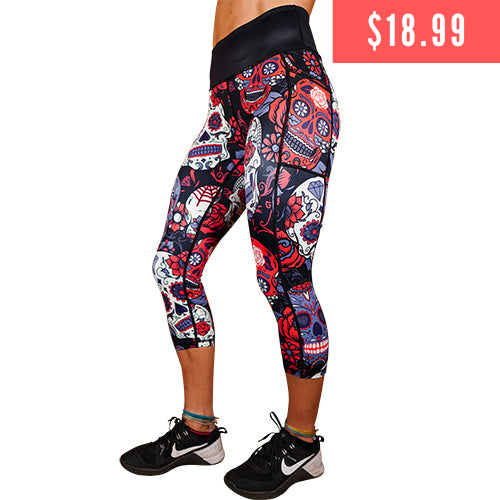 $18.99 capri length white, black, purple and red sugar skull patterned leggings