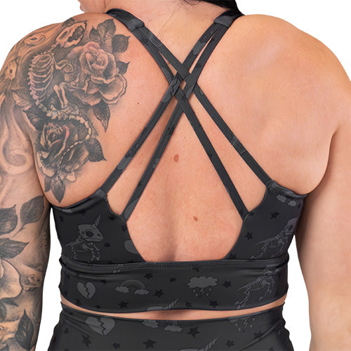 back of the unicorn skull patterned sports bra