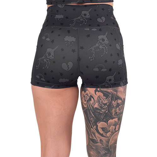 back of the 2.5 inch unicorn skull patterned shorts