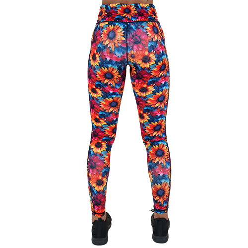 back of full length colorful sunflower patterned leggings