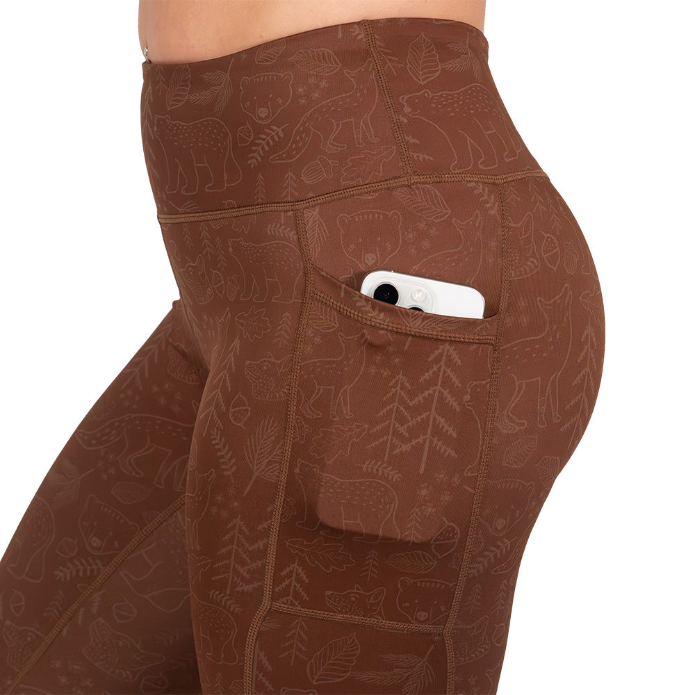 side pocket on brown leggings with animal outlines on them