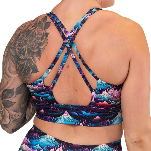 back of the snowy mountain patterned sports bra