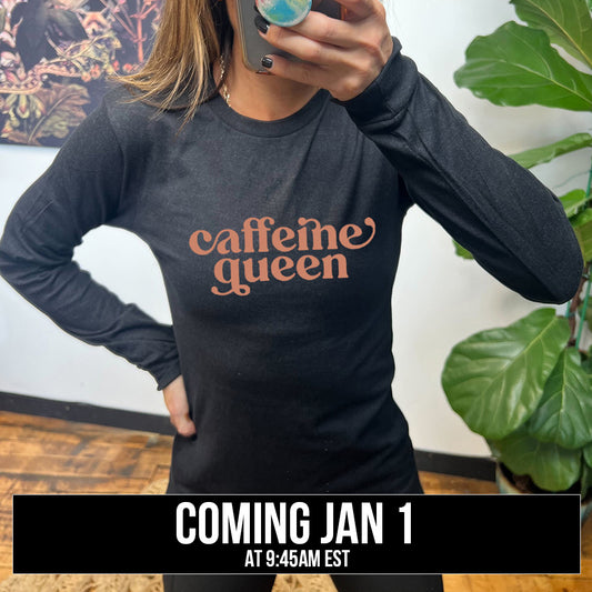 long sleeve tee with the text "Caffeine Queen" on it coming soon