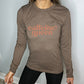 brown long sleeve tee with the text "Caffeine Queen" on it