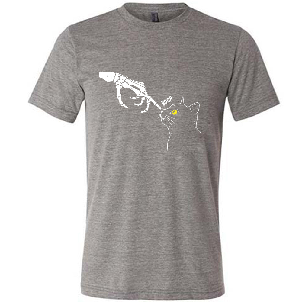 grey shirt with a skeleton hand tapping a cats nose graphic