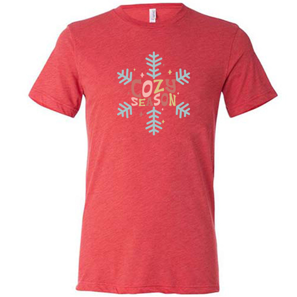 red shirt with the text "cozy season" on it with a snowflake graphic