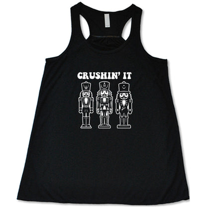 black shirt with the text "Crushin' It" with nutcracker graphics on it