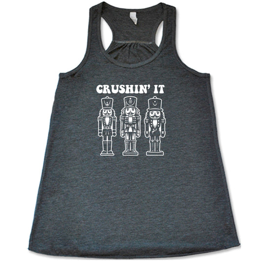 grey shirt with the text "Crushin' It" with nutcracker graphics on it